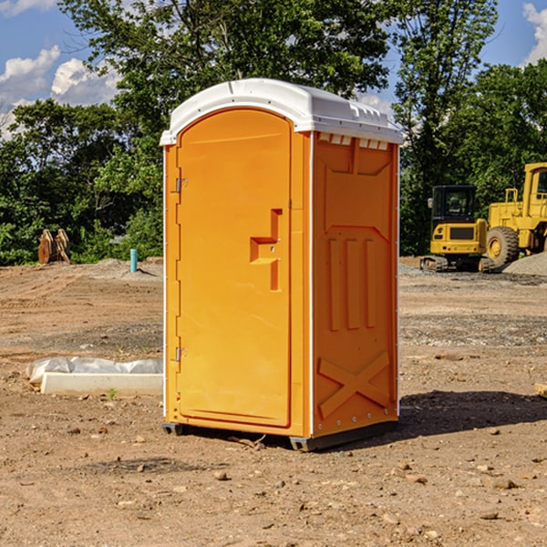 what is the cost difference between standard and deluxe portable restroom rentals in Meadowdale